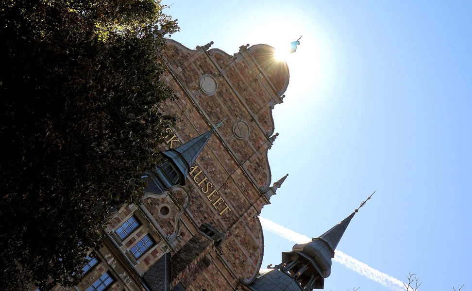 A Sunlit European Clock Tower in Stockholm