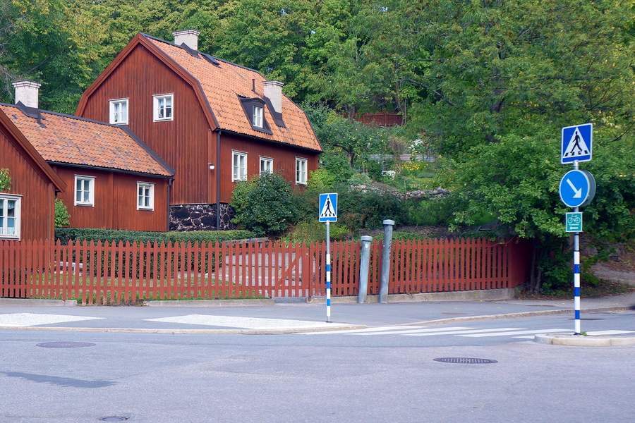 Near-Empty Street with Rural Swedish House