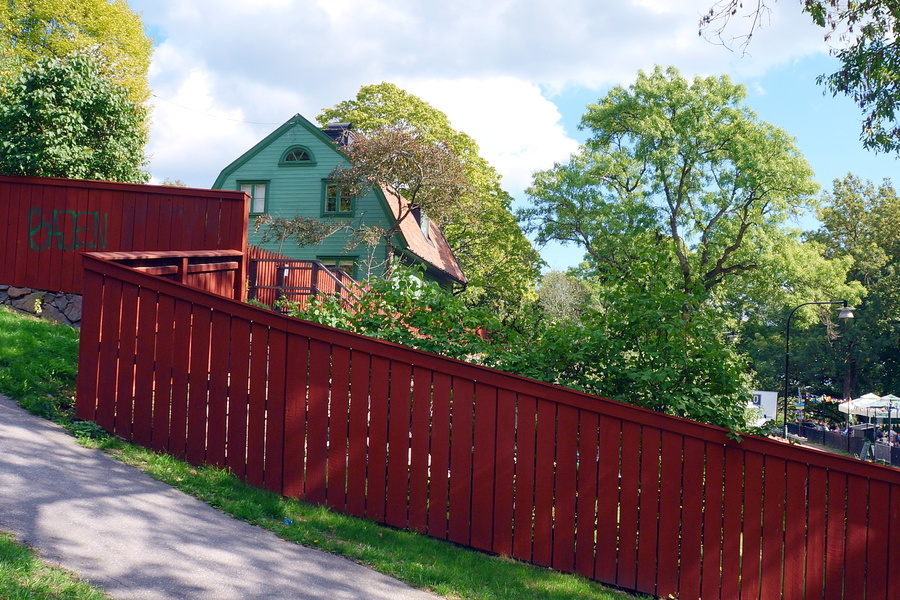 Rural Scene with Red Fence and House