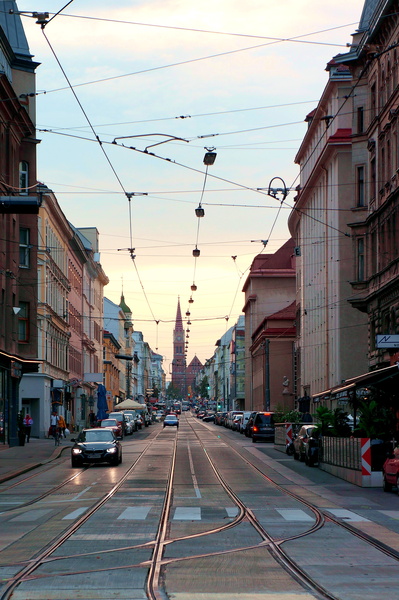 Cityscape with Tram Lines at Sunset
