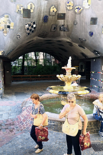City Life in Vienna: A Public Art Display and a Fountain at an Urban Park