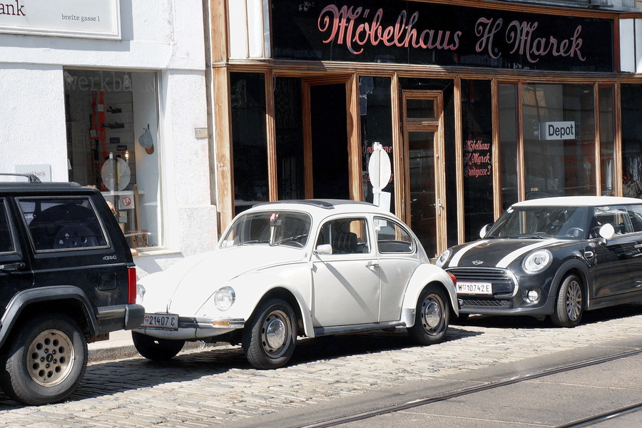 A Quaint Street Scene with Classic Cars