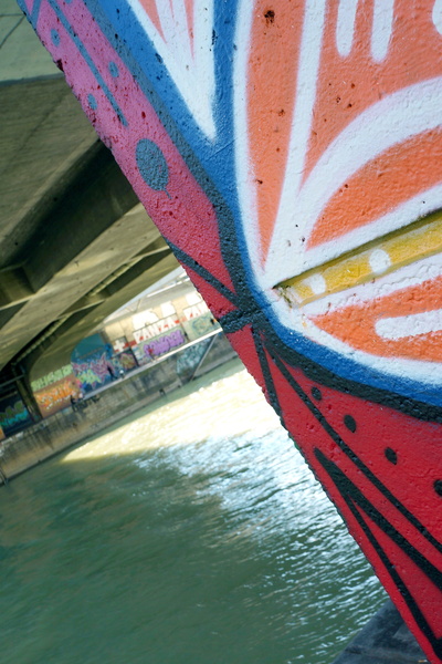 Vibrant Graffiti on Bridge Wall