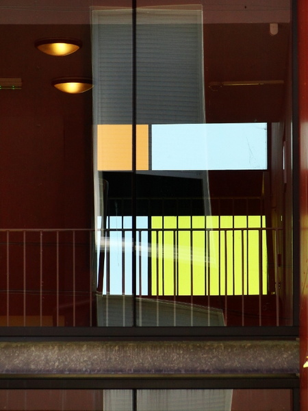 Contemporary Art Space with Glass Panes and Abstract Piece