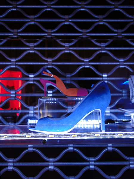 Stylish High Heels on Display in a Store Window