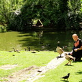 A Man and his Feathered Friends in the Park