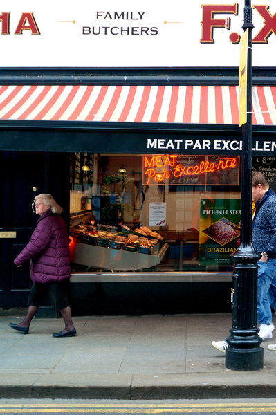 Strolling Past a Butcher Shop