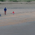 A Family Enjoying a Day at the Beach