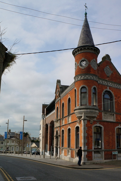 Red Brick Building with Clock Tower and Steeple