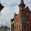 Red Brick Building with Clock Tower and Steeple