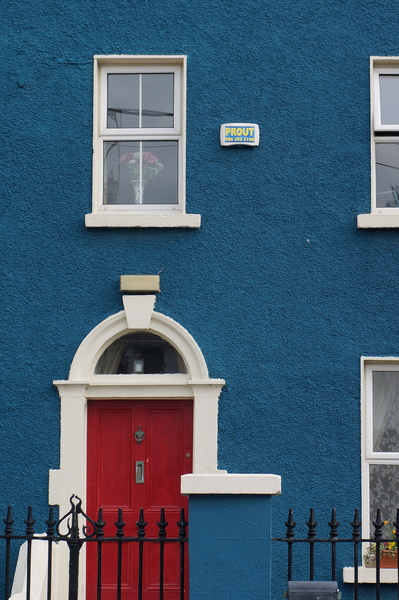 Blue House with a Red Front Door
