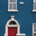 Blue House with a Red Front Door