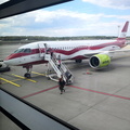Airplane Boarding Process at an Airport Terminal