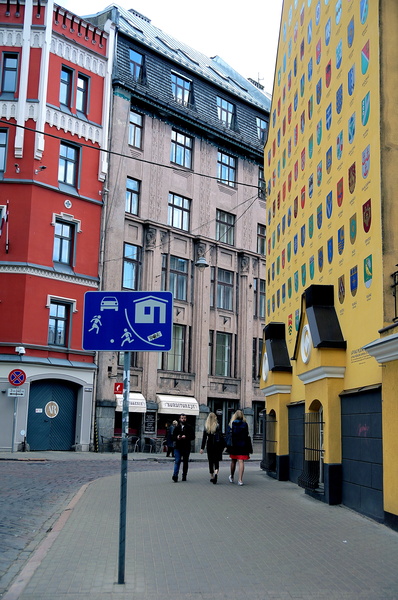 Vibrant Riga Street Corner with Colorful Buildings and Signage