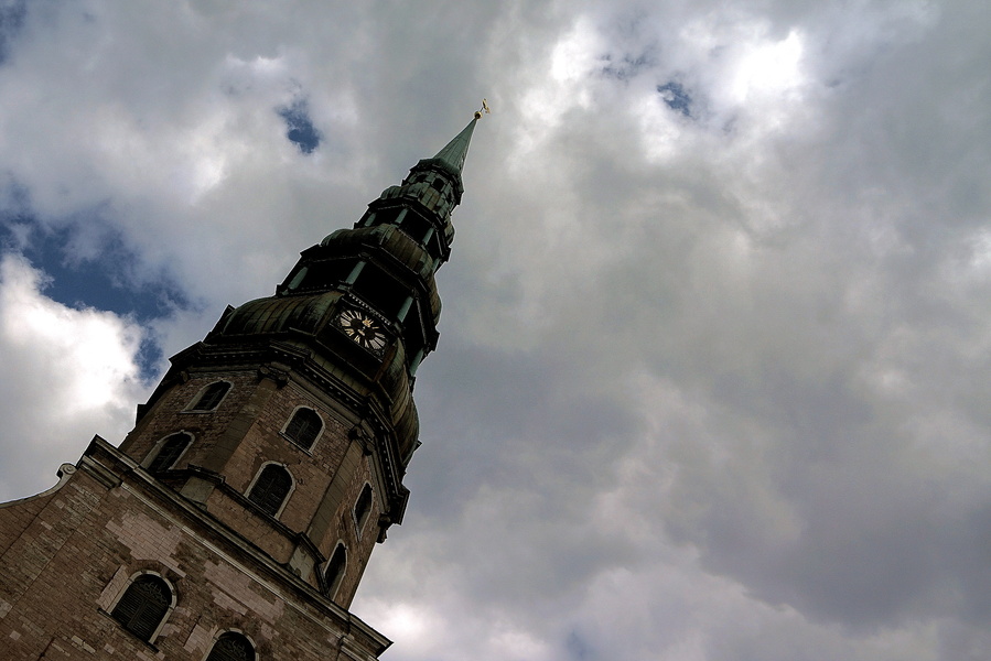 Historic Church Tower against a Stormy Sky