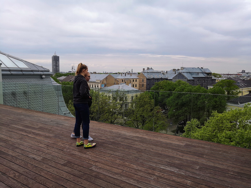 A Moment of Contemplation on a Rooftop Observatory