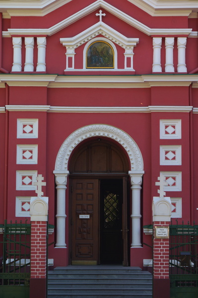 Church Entrance with Red Building