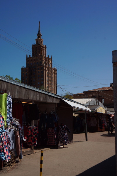 Vibrant Riga Market Place with a Towering Above