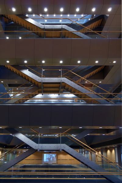 A Futuristic Stairwell with Elevator Access in a Contemporary European Building