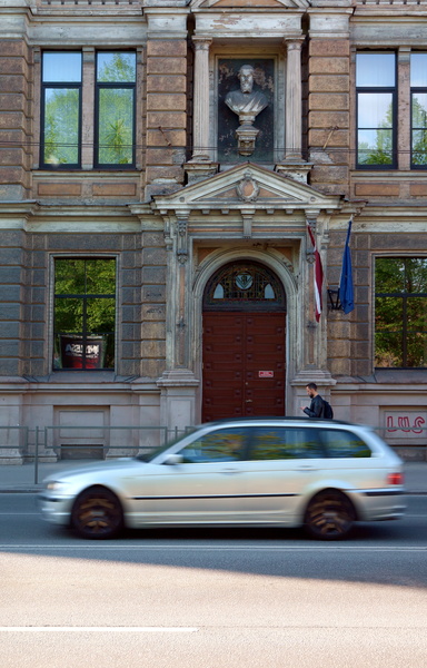 Historic Riga Building with City Life
