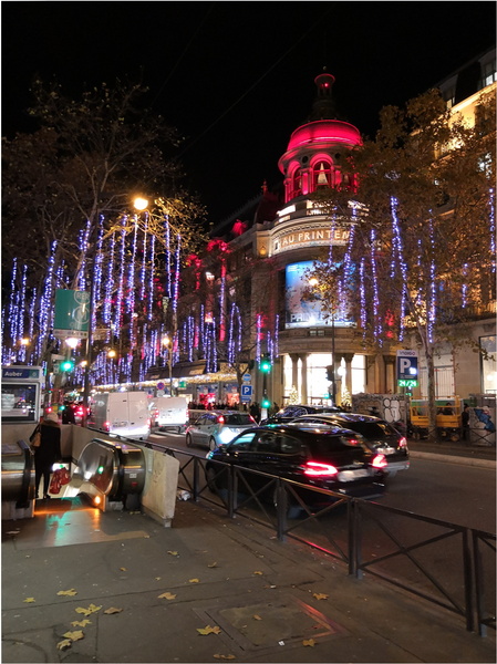 A Festive Parisian Street at Night