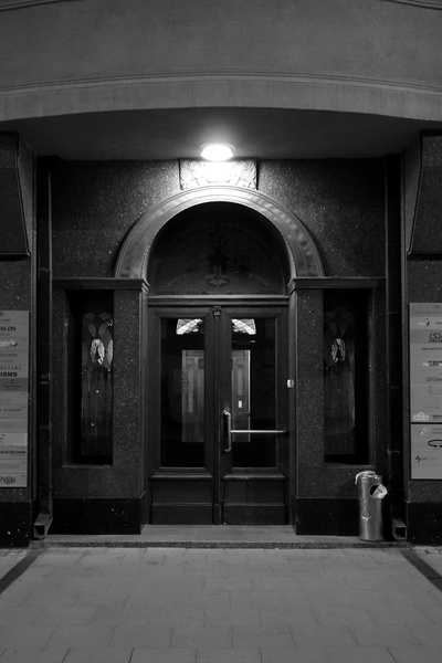 Elegant Entrance to a Building in an Urban Setting at Night