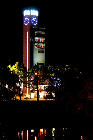 Nighttime Cityscape with Clock Tower and Waterfront