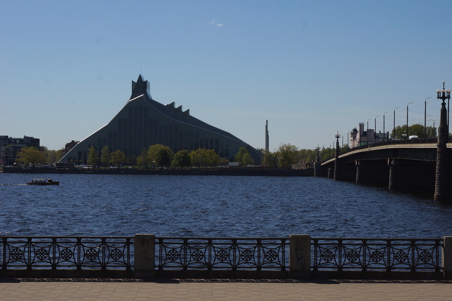 Vibrant Riga Waterfront with Modern Architecture and City Landmarks