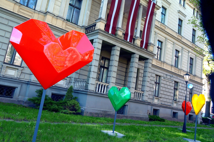 Colorful Heart-Shaped Sculptures in a Courtyard