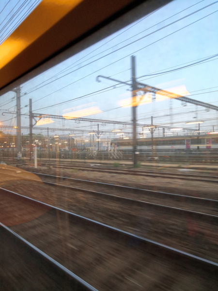 A View Through a Train Window: Rural Countryside Scenery