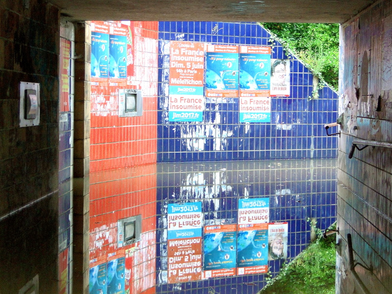 Reflections in a Flooded Subway Tunnel