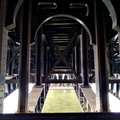 Vibrant French Bridge with Industrial Aesthetic