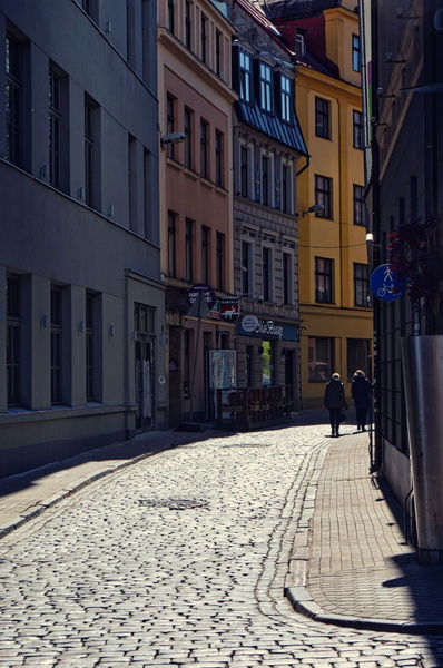 Early Morning in Riga's Old Town: A Narrow Cobblestone Street