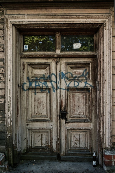 Abandoned Building Doorway with Graffiti