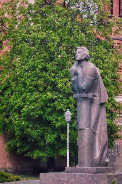 A Prominent Statue of a Figure in a European City