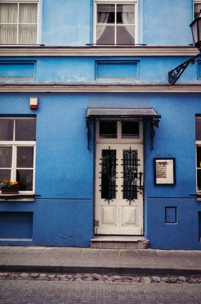 Vilnius Alleyway: A Blue Door in a European City