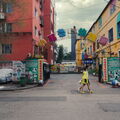 Vibrant City Street with Colorful Signs and Buildings