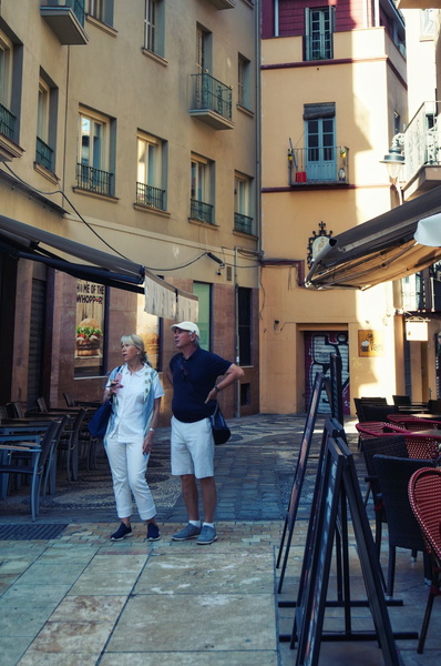 Couple Strolling on a European Street
