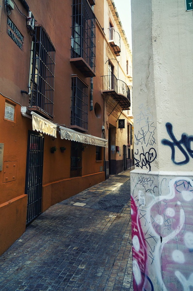 Narrow City Alleyway in Malaga, Spain