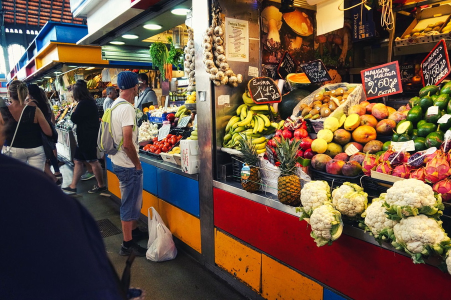 Vibrant Outdoor Market Scene with Fresh Produce on Display