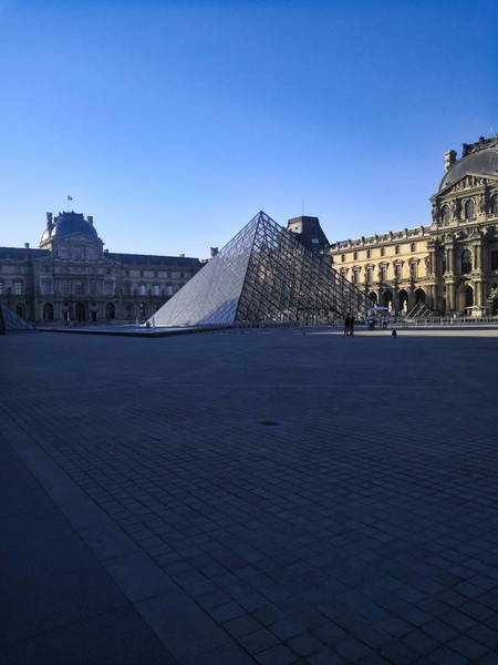 Parisian Courtyard View with the Louvre and Eiffel Tower