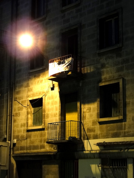 Nighttime Scene: A Quaint Apartment Building