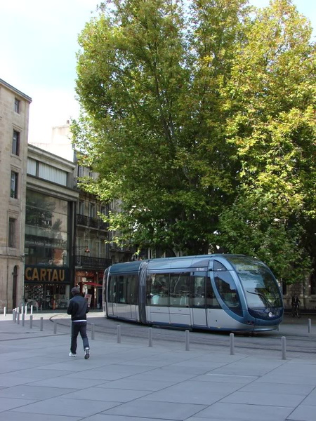 Modern Tram in a Sunlit Square, Bordeaux