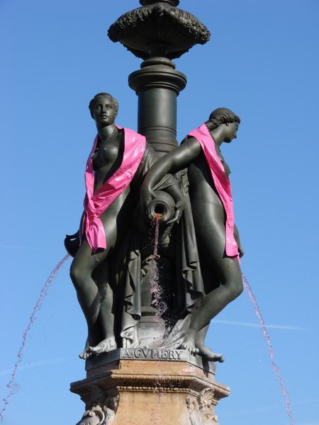 Vintage Fountain with Statues in a City Square