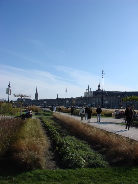 A Scenic European Cityscape with People and Architecture