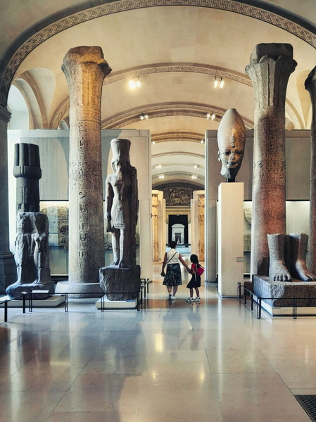 Exploring the Grand Hall of the Louvre Museum