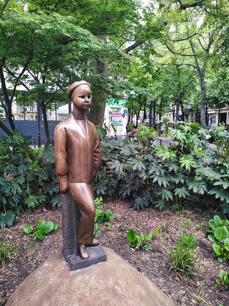 A Statue of a Woman in a Cemetery, Paris