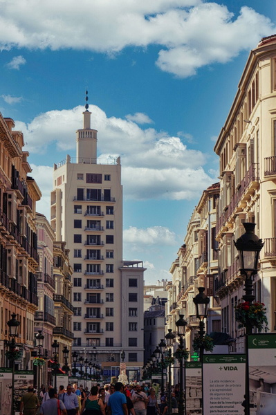 Bright Malaga City Street on a Sunny Day