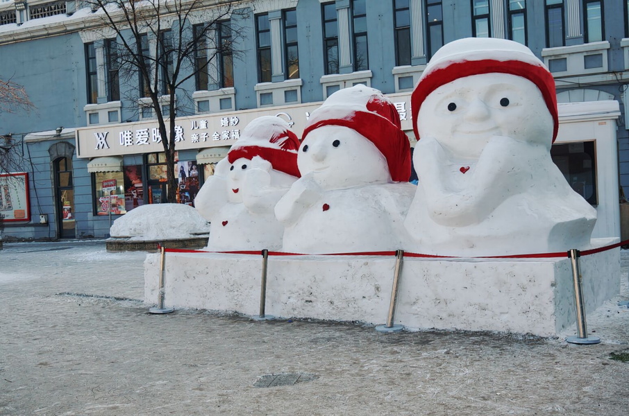 Harbin Ice Festival Sculptures of Snowmen with Santa Hats