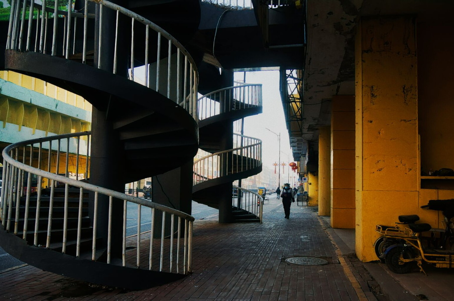 The Solitude of an Empty Modern Spiral Staircase in a Cityscape